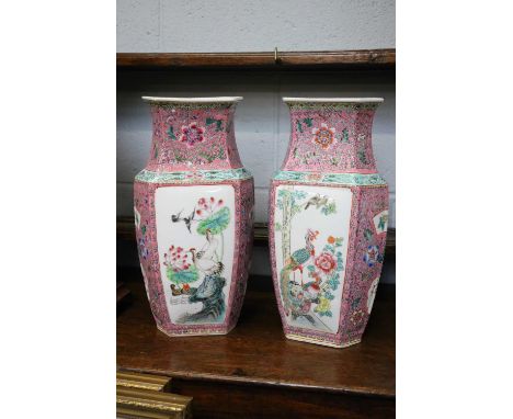 A Pair of 20th century Chinese Famille Rose Vases, of hexagonal baluster form, printed seal mark, 35cm (2)Vases are modern wi