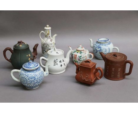 A Group of 19th Century and Later Chinese Teapots, including Yixing and porcelain examples (one tray)Square form Yixing examp