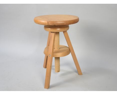 A Modern Circular Seated Swivel Rise and Fall Stool, Tripod Base, 28cms Diameter