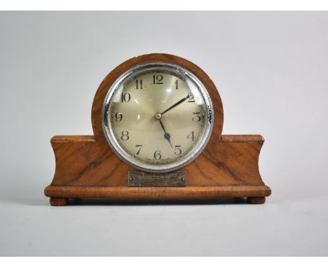 A WWII Presentation Mantel Clock with Plaque inscribed "To Ghoolie Ball, From the Sergeants of A Battery, H.A.C", 20cms Wide