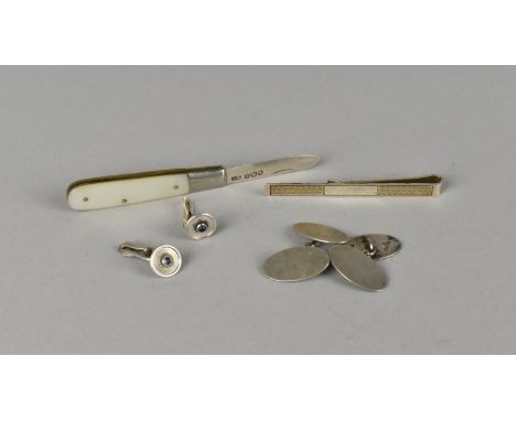 A Silver Bladed Penknife with Mother of Pearl Scales, Hallmarked for Sheffield 1925 by W.N, a Silver Tie/Money Clip and Two P