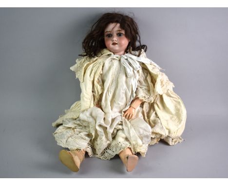 A Late 19th Century Simon and Halbig Bisque Socket Head Doll with Sleeping Eyes and Open Mouth, Composition Jointed Body, Num