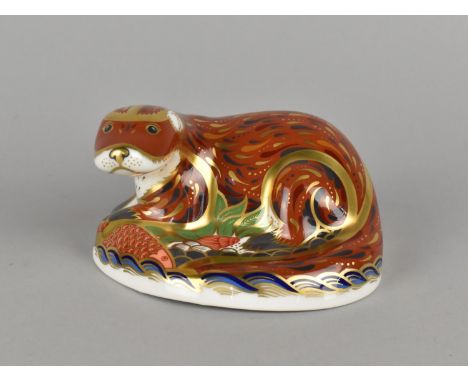 A Royal Crown Derby Paperweight, Otter, Gold Button