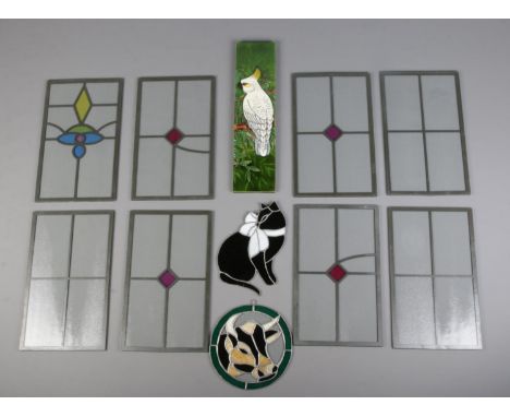 A collection of modern stained glass, including several door panels, together with a 'Tri-colour' tile of a Cockatoo.  
