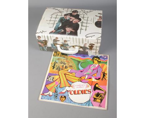 The Beatles Westminster portable record player along with A Collection of Beatles Oldies vinyl record.  