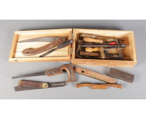 A tool box with contents of vintage tools. To include Rabone Chesterman spirit level, Stead &amp; Co (Sheffield) chisel, Rabo