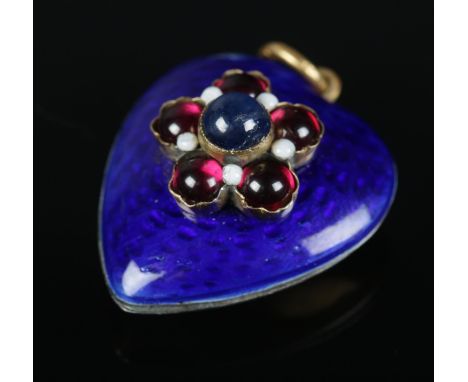 A high carat gold enamel heart shaped pendant set with floriform garnets. 9.26g gross weight.  Tested as gold.