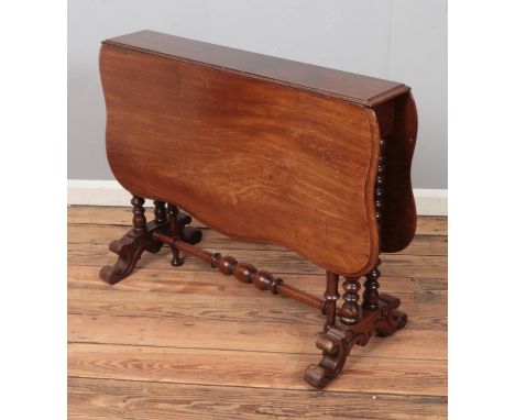 A mahogany Sutherland drop-leaf table raised on bobbin turned supports. Approx. dimensions 108cm x 93cm when extended.  