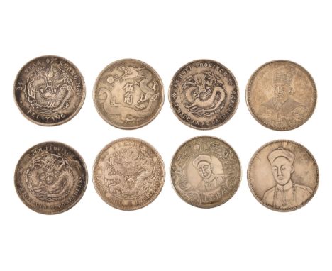 A group of eight Chinese silver and white metal coins including a Peking 7 Mace and 2 Candareens coin, an An-Hwei Province 7 