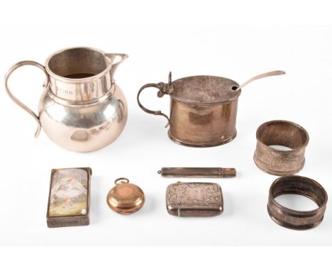 A group of silver items, including two napkin rings, one hallmarked for Chester 1922, the other for London 1876, a Victorian 
