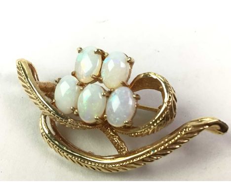 OPAL BROOCH, unmarked, set with five opals