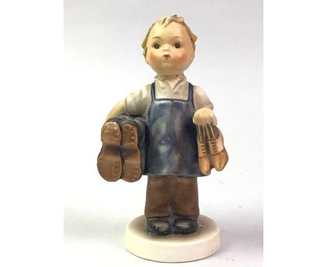 GROUP OF GOEBEL FIGURES, one figure skiing, another holding a basket and other Goebel figuresQty: 6