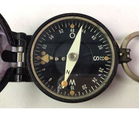 GERMAN BUSCH BLACK LACQUERED MARCHING COMPASS, stamped marks 45347 D.R.G.M.5.5cm diameter