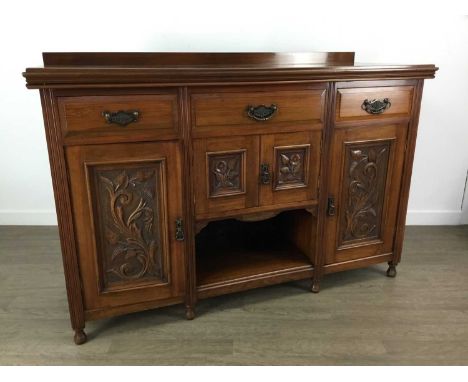 WALNUT SIDEBOARD, EARLY 20TH CENTURY  with carved panelled doors and open shelf102cm high, 153cm wide