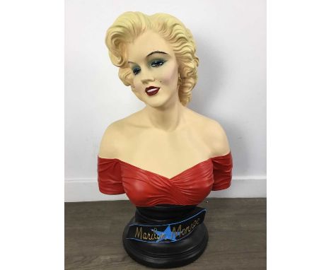 LARGE MARILYN MONROE BUST, possibly a shop display, on a raised socleRed marks to shoulder , visible on images, otherwise goo