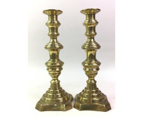 PAIR OF BRASS CANDLESTICKS AND OTHER BRASS AND COPPERWARE including copper jug by Joseph Sankey, brass fire tools and a set o