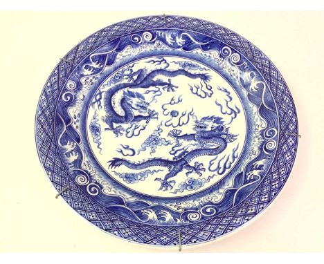 CHINESE BLUE & WHITE CHARGER, decorated with two five clawed dragons chasing a sacred pearl, mark to base,38cm diameter