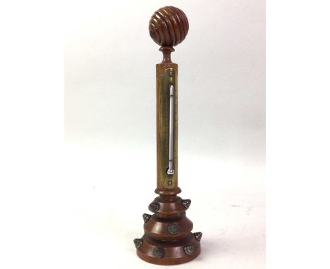 DESK THERMOMETER, EARLY 20TH CENTURY  in oak, with ball finial28cm high