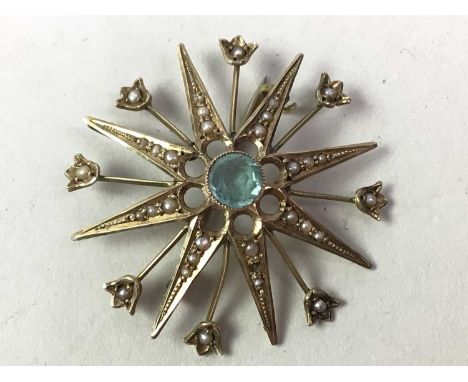 NINE CARAT SEED PEARL BROOCH, modelled as a flower