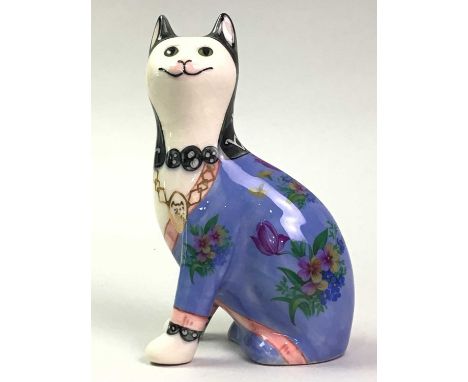 GRISELDA HILL POTTERY, WEMYSS CAT, decorated with foliate sprays18cm highHeavily crazed, no obvious chips or damage.  Further