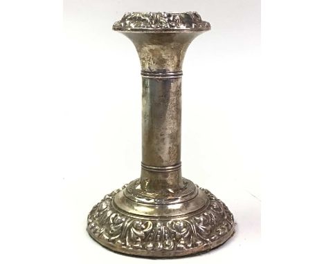 GROUP OF SILVER, comprising an Edwardian turned column candlestick and a silver bon bon dishcandlestick 13.2cm high