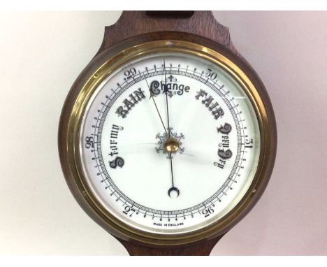 OAK BAROMETER, EARLY 20TH CENTURY with carved scroll work82cm high