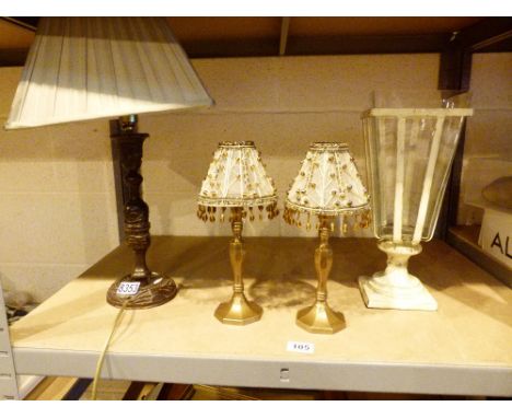 Hand carved step lamp, two candle lamps and a steel framed vase 