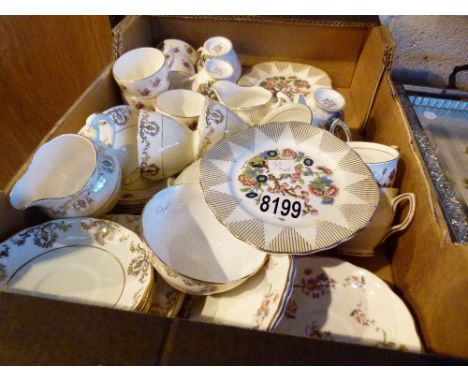 Shelf of mixed teaware 