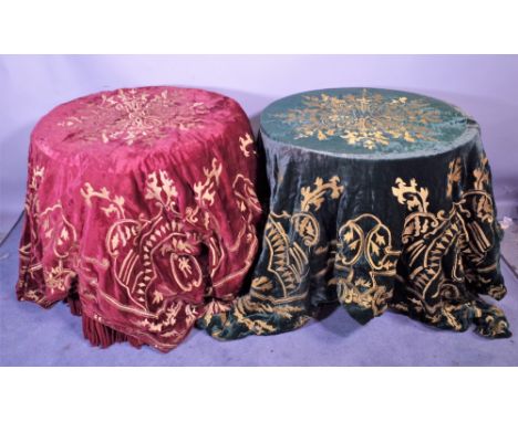 An early 20th century red velvet and gold thread embroidered table cloth and another in green, (2). Provenance; property from