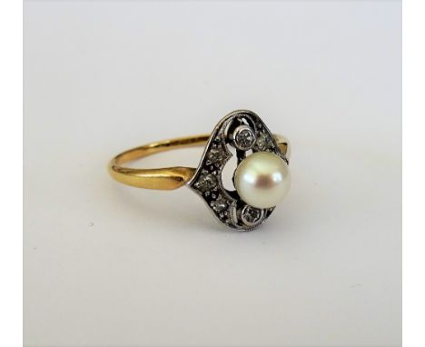 A gold, diamond and cultured pearl ring, in a pierced shaped oval design, mounted with the single cultured pearl to the centr