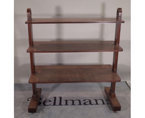 An early 20th century mahogany three tier graduated buffet, 115cm wide x 53cm deep x 135cm high. Provenance; property from th