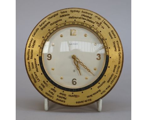 A Luxor gilt metal world alarm table clock, circa. 1960, with adjustable bezel, 11cm diameter. 