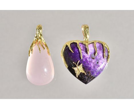 A gold mounted, purple stained agate pendant of heart shaped form, with a butterfly motif, detailed 14 K and a gold mounted r