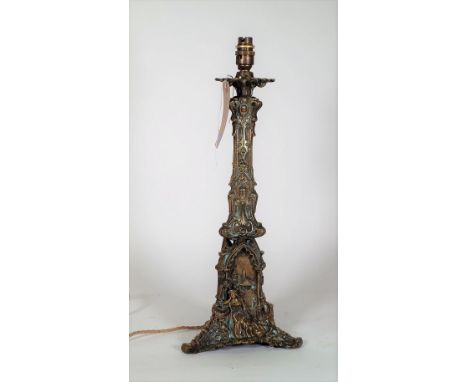 A Victorian brass table lamp with a figural embossed scene to the base, 53cm high. 