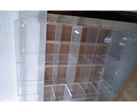 A pair of 20th century perspex three tier open bookcases, 101cm wide x 81cm high, (2).  Provenance; property from the late Si