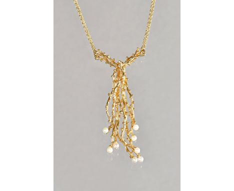 A 9ct gold and seed pearl necklace, in an abstract design, having beaded decoration, import mark London 1970, on a sepentine 