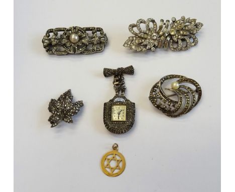 A 9ct gold Star of David pendant, Chester 1962, weight 0.7 gms, a Bucherer marcasite set brooch mounted lady's pendant watch,
