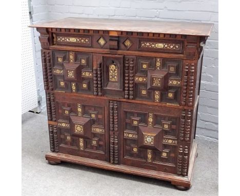 A 17th century and later bone and mother-of-pearl inlaid, geometric moulded cabinet, with one long drawer over fall front and