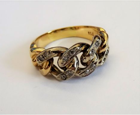 A gold and diamond ring, in a curb link design, mounted with pairs of circular cut diamonds, detailed 750, ring size M, gross