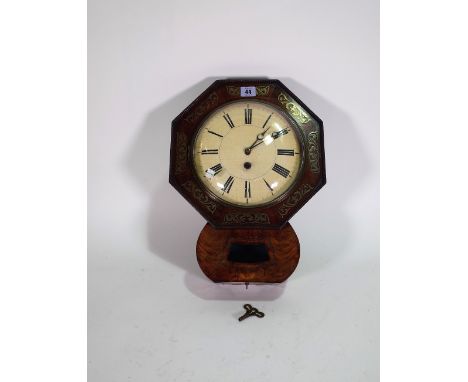 A late Victorian mahogany and brass inlaid octagonal wall clock, 31cm wide x 43cm high. 