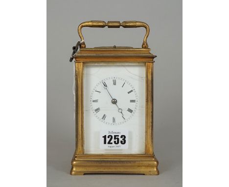 A brass cased carriage clock, early 20th century, with plain enamel dial, push repeat and two train movement, 14cm high, (key