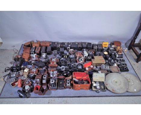 Photographic interest, including; a large quantity of Vintage cameras, lenses and equipment, Voightlander, Minolta, various f