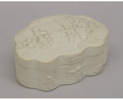 A Chinese white biscuit porcelain box and cover, Qianlong seal mark but later, of ruyi-head form, the cove rmoulded in relief