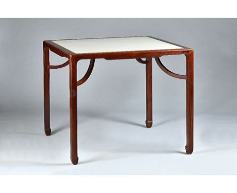 A late 19th/early 20th century Chinese hardwood square centre table, possibly huanghuali, with marble inset top above undersl