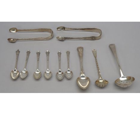 Silver table flatware, comprising; a Victorian sugar sifting spoon, having a spiral stem, London possibly 1866, six teaspoons