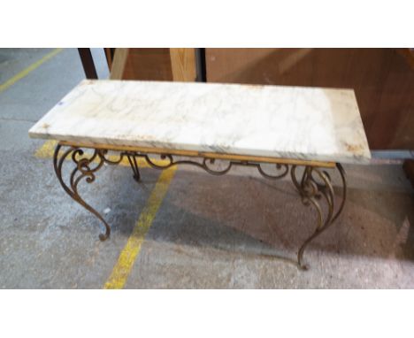 A 20th century gilt metal rectangular coffee table of scrolling form and associated marble top, 112cm wide x 58cm high.  Prov