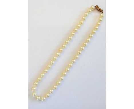 A single row necklace of uniform cultured pearls, on a 9ct gold and cultured pearl set clasp, length including clasp 38cm, wi