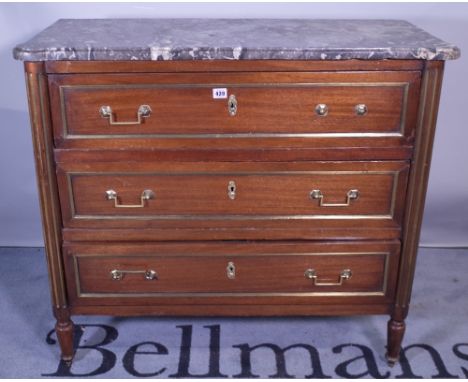 A 19th century French marble topped commode, the shaped marble over three long drawers on tapering supports, 96cm wide x 89cm