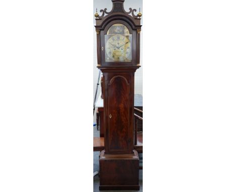 A George III mahogany longcase clock by Edmund Starr Norwich, the arch hood enclosing a brass engraved dial with subsidiary s