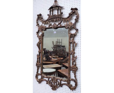 A Chippendale Revival mirror, silvered frame with pagoda surmount above pierced scrolling frame, with icicle detailing, 142cm